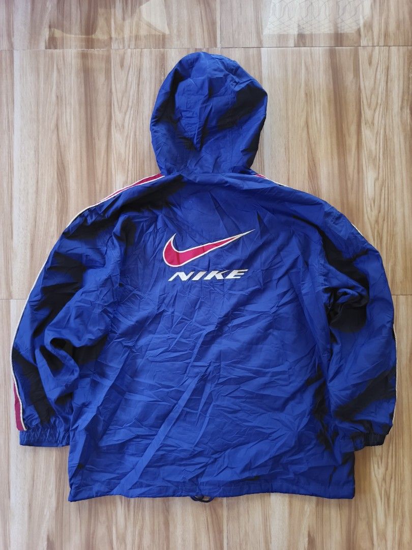 Nike Blue Windbreaker Jacket Hoodie (Category: Coats, Jackets and Outerwear) located in Trinidad. Submitted by johnmarkso25128 (Listing ID 1463591448, Image 2). Description: flawless condition 10 color rate 10 dimes 26.5×31.