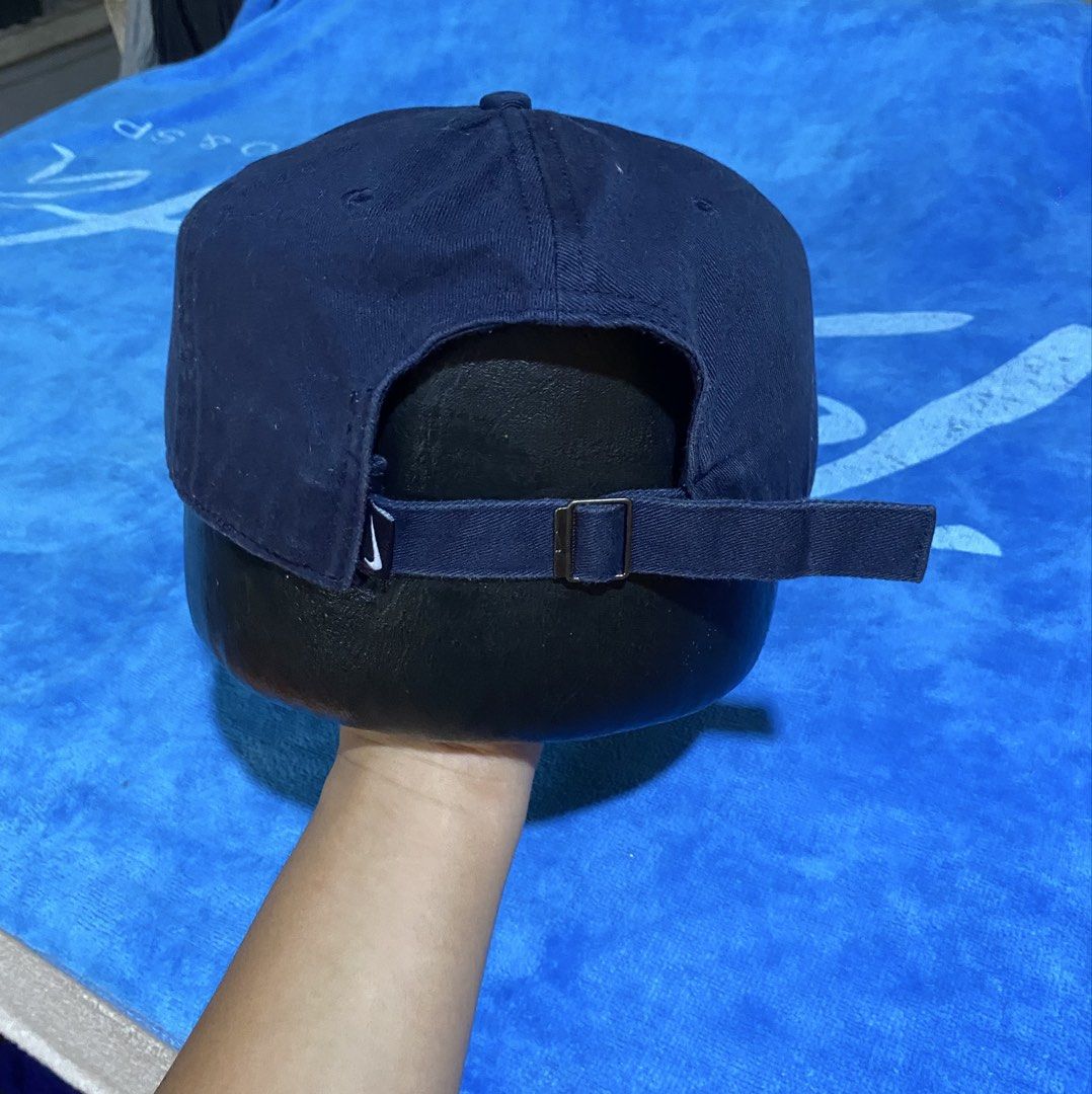 Nike cap (Category: Caps & Hats) located in Cebu City. Submitted by jerianix (Listing ID 1463627169, Image 3). Description: Nike cap One size Good condition Issue : small bends on brim right side .