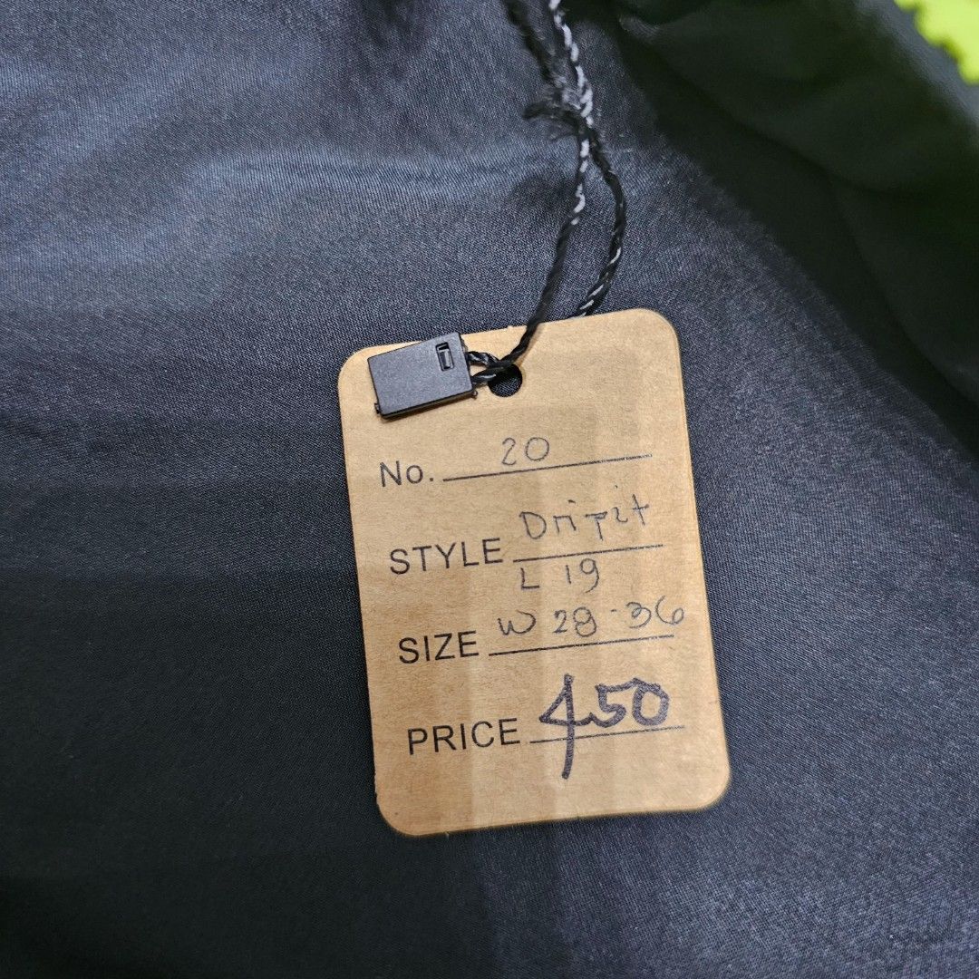 Nike Drifir Neon blacK Shorts (Category: Shorts) located in Baguio. Submitted by kayeonlineshop (Listing ID 1463619309, Image 3). Description: black Nike Dri-FIT athletic shorts featuring neon green side panels and a white Swoosh logo on the leg W28-36 L 19 h26.