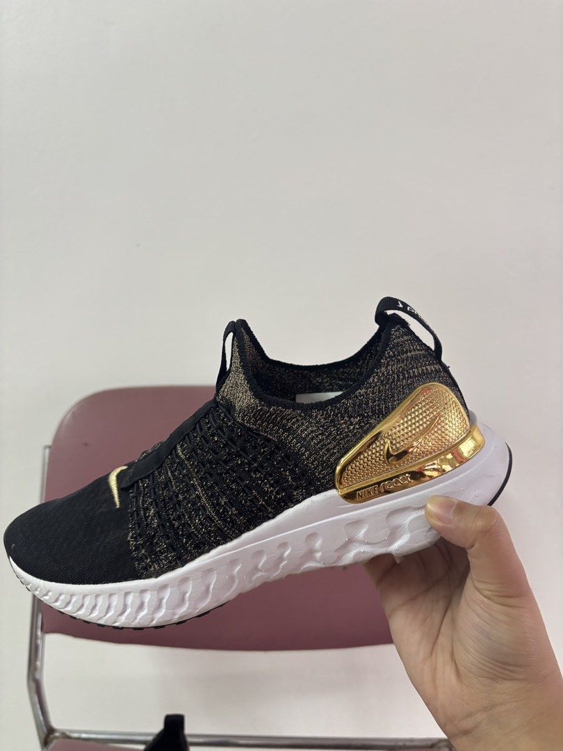 Nike Epic React Flyknit 2 Phantom (Category: Sneakers) located in Cavite. Submitted by xxjanexx08 (Listing ID 1463639678, Image 2). Description: Nike Epic React Flyknit 2 Phantom Black/Metallic Gold colorway Style Code: BV0070-001 / CJ0628-001.