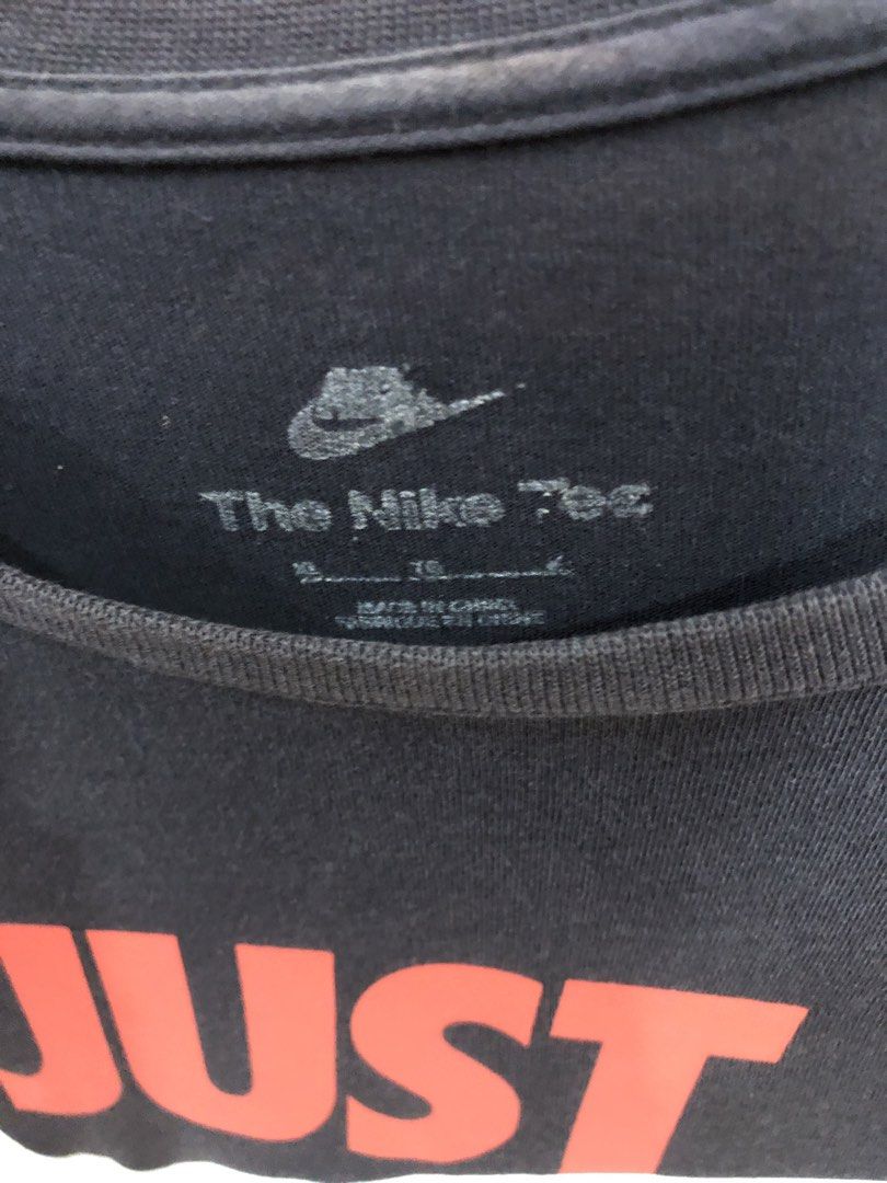 Nike Just Do It T-Shirt (Category: Shirts) located in Manila. Submitted by bakithrift213 (Listing ID 1463635059, Image 2). Description: - Classic black Nike t-shirt - Features iconic 'Just Do It' slogan and swoosh - Made from comfortable fabric - Ideal for casual wear or workouts - Highly versatile and easy to pair with any outfit.