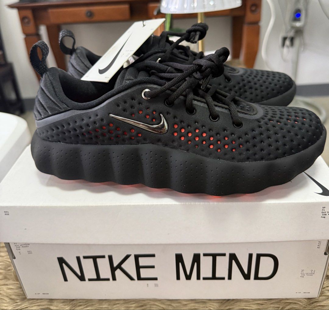 Nike MIND Running Shoes Black (Category: Sneakers) located in Las Pinas. Submitted by fayeabell (Listing ID 1463600146, Image 1). Description: - Black Nike MIND shoes - Perforated upper with orange accents - Comes with original box - Box features foot pressure mapping - Ideal for running or casual wear -brand new with receipt.