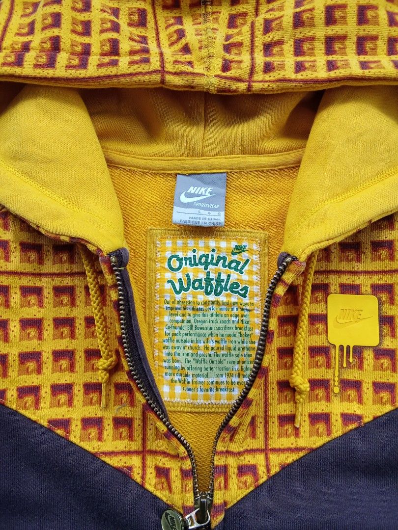 Nike Original Waffles Zip-Up Hoodie (Category: Coats, Jackets and Outerwear) located in Polomolok. Submitted by timog_high_ice_v2 (Listing ID 1463610476, Image 3). Description: - Super cool Nike hoodie - Size Large on tag - Width 18 - Length 24 - Fun yellow and brown waffle print - Full zip-up front with pockets - Waffle pattern on hood and upper chest - "Original Waffles" graphic inside - "Waffle" detail on sleeve cuff - Great for casual wear So