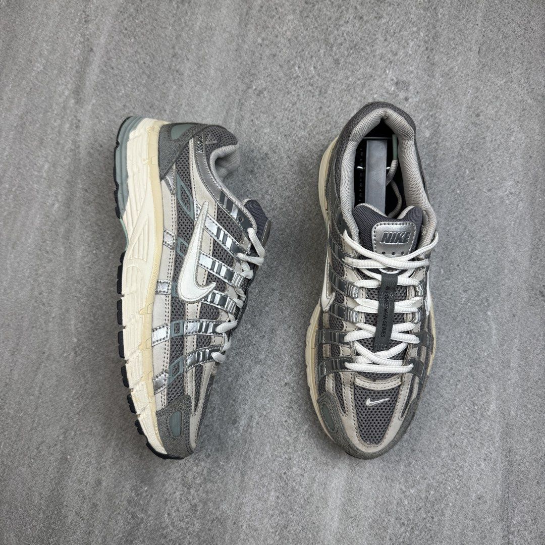 Nike P-6000 Metallic Silver Grey Running Shoes (Category: Sneakers) located in Manolo Fortich. Submitted by thrift_by_biji (Listing ID 1463688565, Image 2). Description: - Nike P-6000 Sneakers - Color: Metallic Silver & Grey - Classic running shoe design - Comfortable for everyday wear - Stylish and versatile.