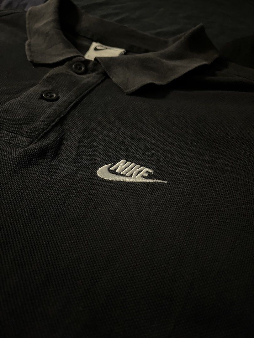 NIKE POLOSHIRT (Category: Tshirts & Polo Shirts ) located in Manila. Submitted by urbanhits (Listing ID 1463609618, Image 2). Description: NIKE EMBROIDERY DESIGN BLACK POLOSHIRT / 26 length / 20 width / 9/10 Condition 9/10 Color Rate slight collar fade & need wash (issue).