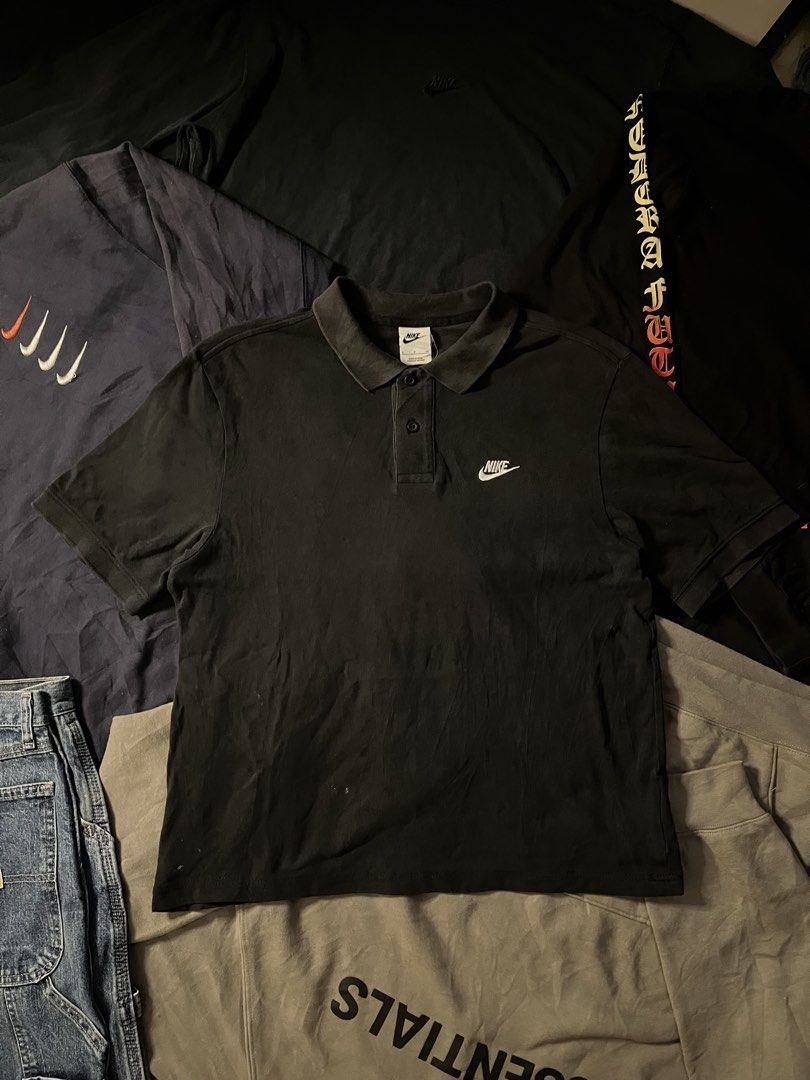 NIKE POLOSHIRT (Category: Tshirts & Polo Shirts ) located in Manila. Submitted by urbanhits (Listing ID 1463609618, Image 1). Description: NIKE EMBROIDERY DESIGN BLACK POLOSHIRT / 26 length / 20 width / 9/10 Condition 9/10 Color Rate slight collar fade & need wash (issue).