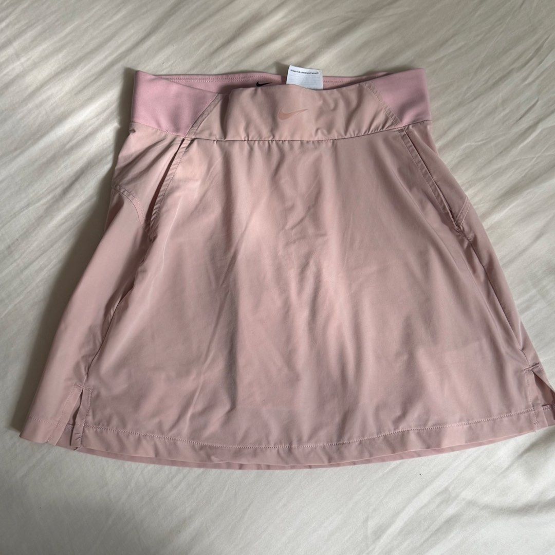Nike tennis / golf skirt (Category: Activewear) located in Quezon City. Submitted by mdlrrr (Listing ID 1463598587, Image 1). Description: Has built-in shorts! Super comfy + love the pink color 💓 Rfs: Decluttering .