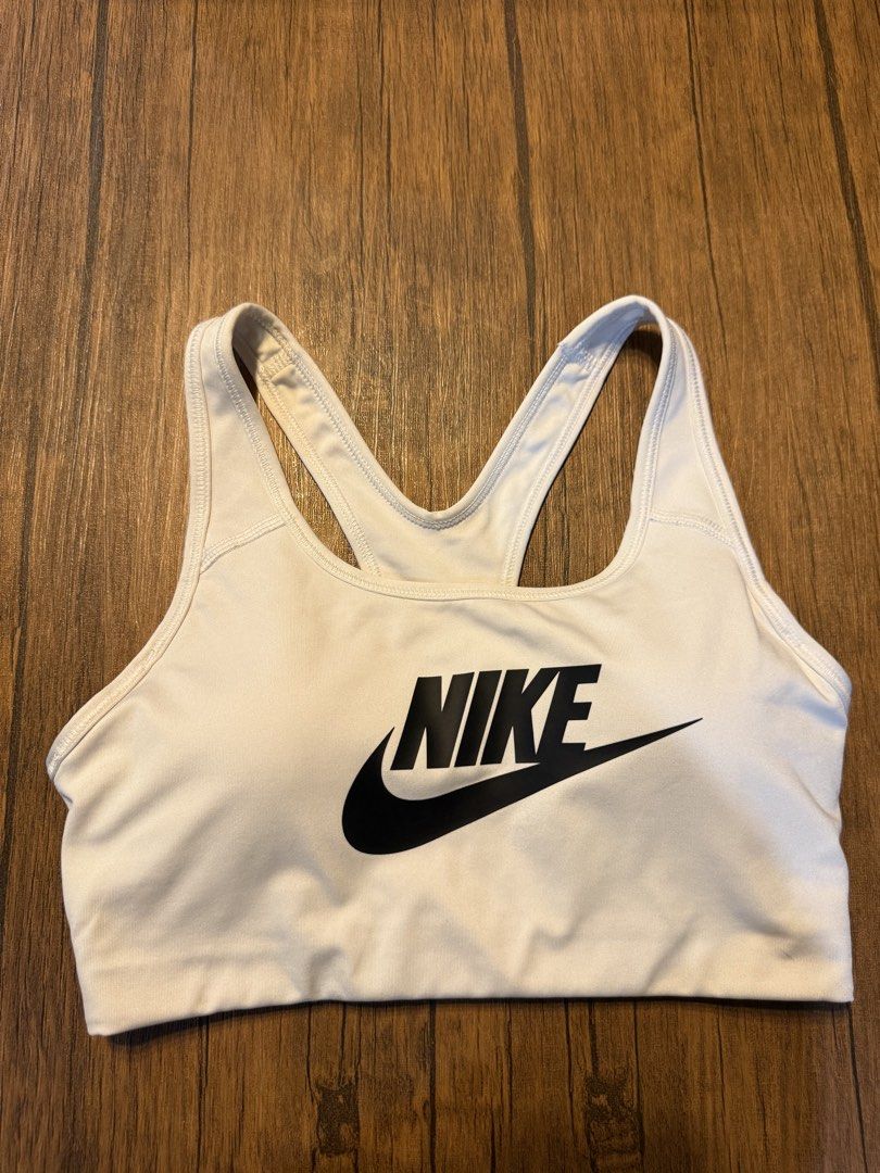 Nike White Sports Bra MEDIUM 3for1K (Category: Activewear) located in Makati City. Submitted by lucy_dec (Listing ID 1463661135, Image 1). Description: - White Nike sports bra - Racerback style - Black Nike logo on the front - Comfortable for workouts - Provides good support - Ideal for gym sessions or running RFS: decluttering.