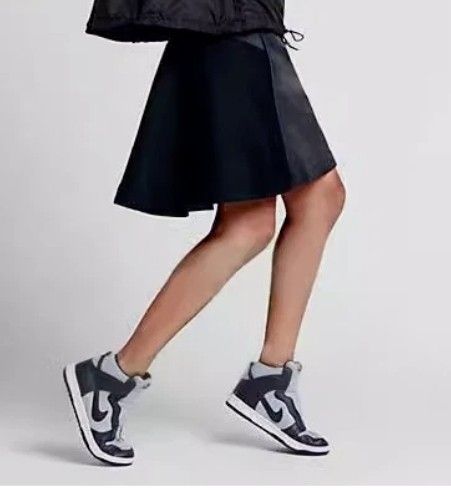 NikeX Sacai Skirt (Category: Skirts) located in Mabalacat. Submitted by uniqlover (Listing ID 1463621026, Image 2). Description: - Elastic waistband with drawstring - Front pockets - Flared, layered design - Lined interior - Ideal for sports and casual outings.