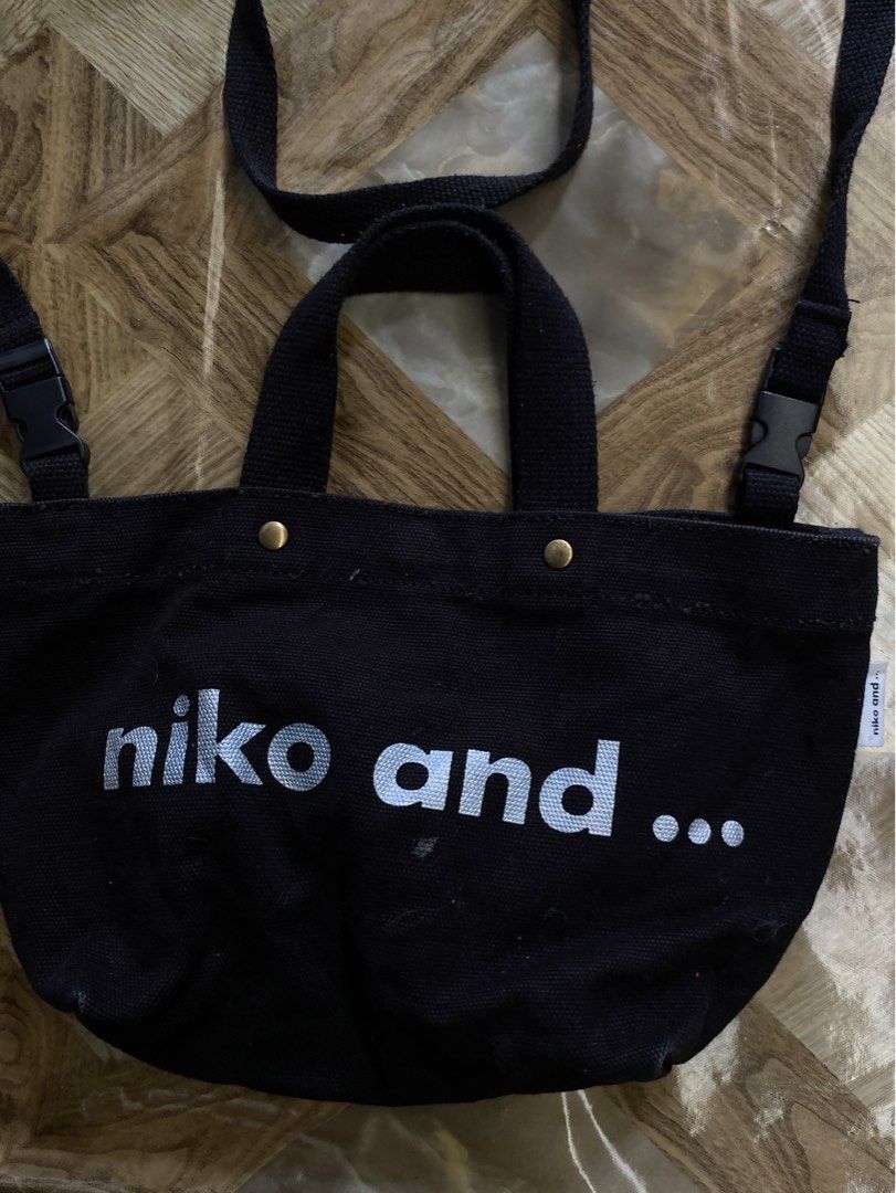 Niko and.. Sling Bag Black (Category: Sling Bags) located in Davao. Submitted by workmensph (Listing ID 1463571812, Image 2). Description: W- 10” L-7” Very Good Condition .