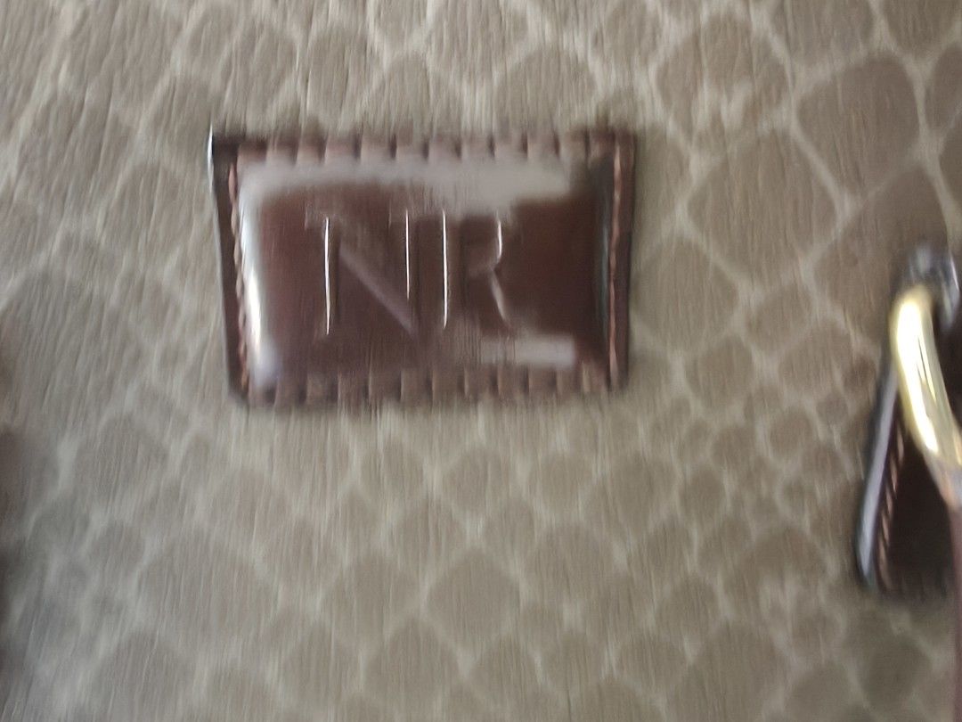 Nina Ricci Tote Bag (Category: Luxury Bags & Wallets) located in Paranaque City. Submitted by onlineshopwithsec (Listing ID 1463569570, Image 3). Description: - Classic Nina Ricci tote bag - All-over monogram pattern - Dark brown leather trim and handles - Zipper closure at the top - Interior zippered compartment - Great for everyday use lenght 8" width 9".