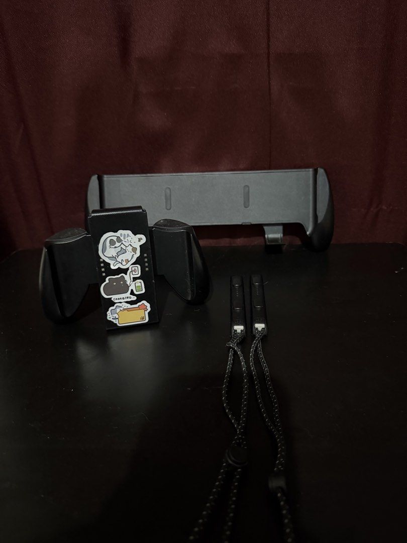 Nintendo Switch Accessories (Category: Other Mobile & Gadget Accessories) located in Caloocan City. Submitted by rohllee (Listing ID 1463559163, Image 1). Description: Nintendo Switch Accessories OLED Grip - 400 Controller Grip - 400 Wrist Straps - 150 Take all for 800.