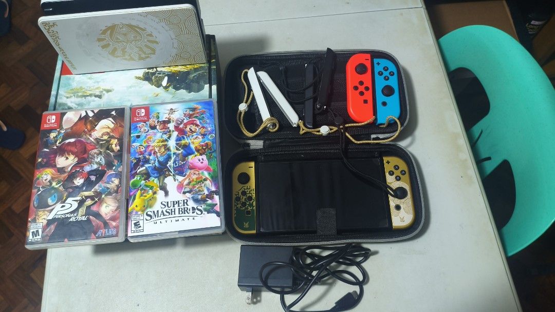 Nintendo Switch Console ToTK Version Oled (Category: Nintendo) located in Muntinlupa City. Submitted by pvmper (Listing ID 1463569198, Image 1). Description: For Sale Switch ToTK Version Price: 21k all in (Negotiable) Wysiwyg Can meetup festival mall or ATC, Alabang area for testing. All video testing proof you need for online transaction. Lalamove shipping available. Issues: Different HDMI cable. Everything else is in good condition. Extra inclu