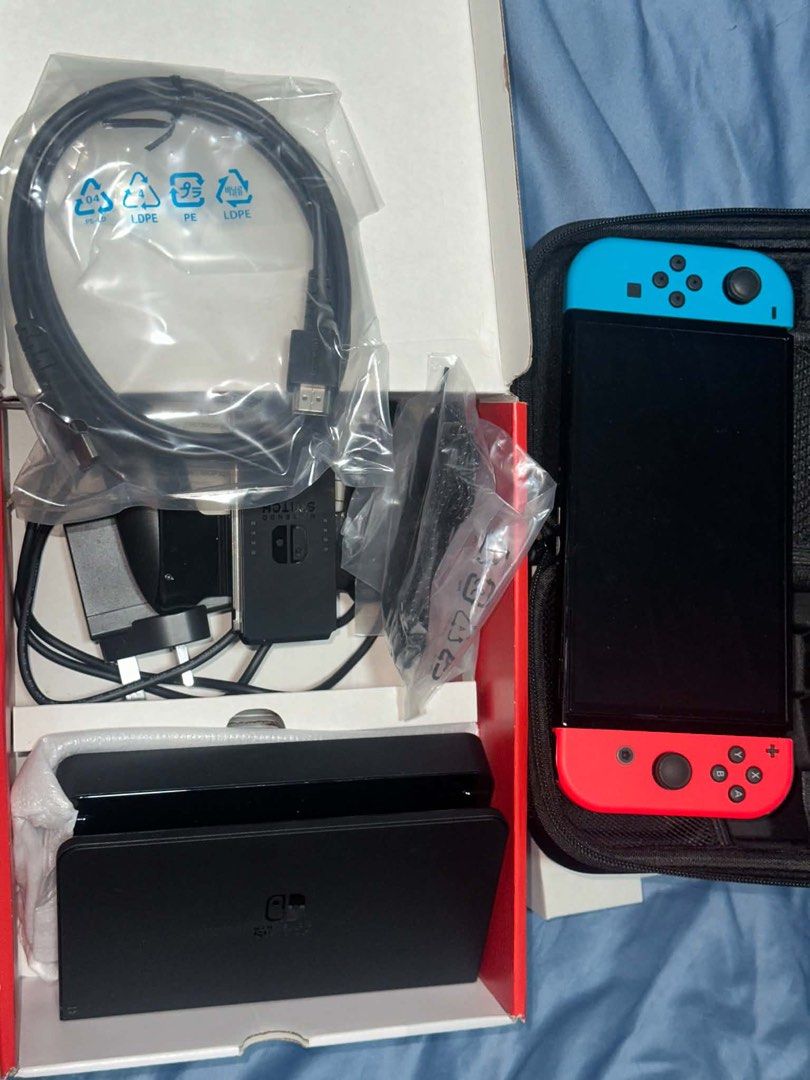 SALE‼️ Nintendo Switch OLED with Joy-Con (Category: Nintendo) located in San Francisco. Submitted by chicpickcloset_ (Listing ID 1463706632, Image 1). Description: Hi! Selling my brother’s nintendo switch✨ -Excellent Condition pa to, Di nya masyadong nagagamit - With Complete Inclusions pa (All OG) - With free 256 gb SanDisk Ultra 256GB microSD Card - With free case nadin - Nabili sya sa GameOne PH - 🧡 app - Can send unli details sa switch, and 