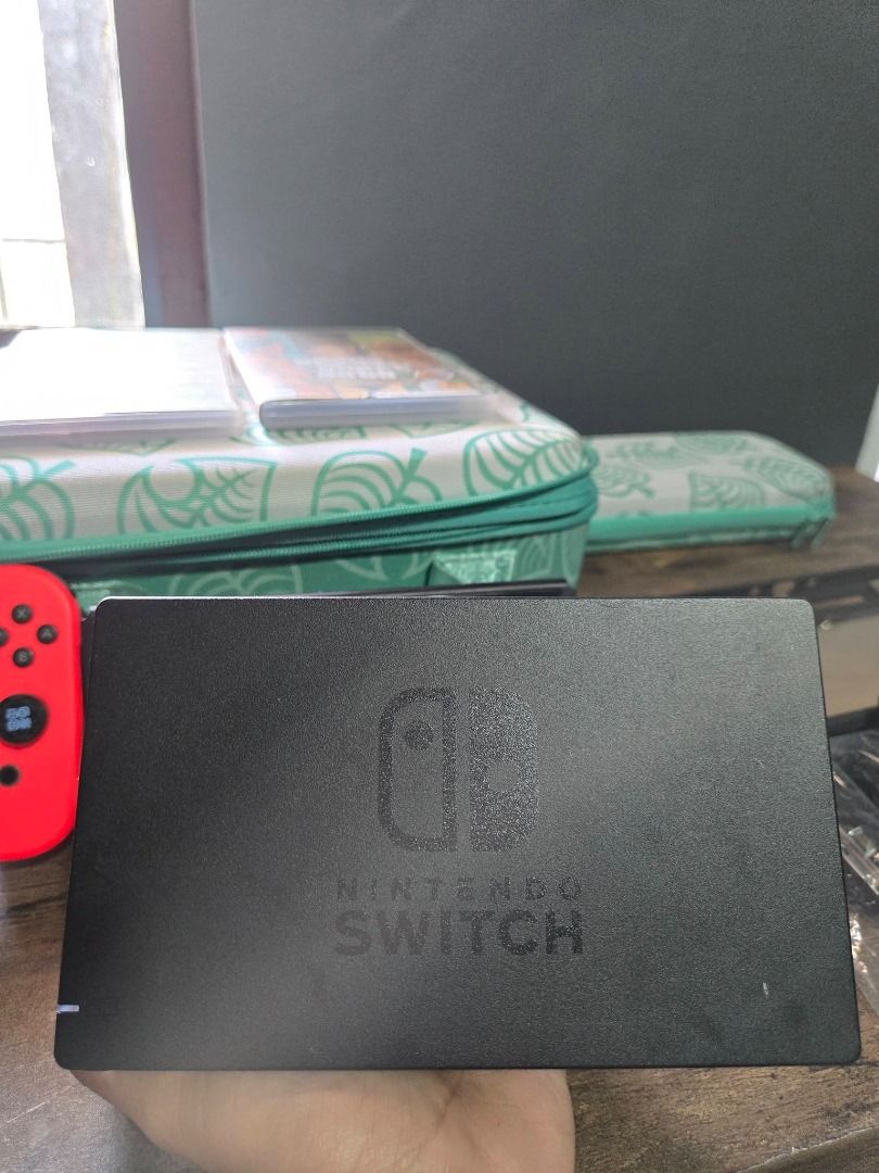Nintendo switch v2 (Category: Nintendo) located in Caloocan City. Submitted by fastshark_c119df (Listing ID 1463648864, Image 3). Description: Nintendo Switch V2 10.5k With tempered glass. No performance issue. No stick drift. No history of repair. All accessories are original. - 1 free game (Gal Metal) - 1 GTA Trilogy - joycon (no issues) - dock - hdmi cable - power cord - joycon grip - joycon strap - free case - free pouch.