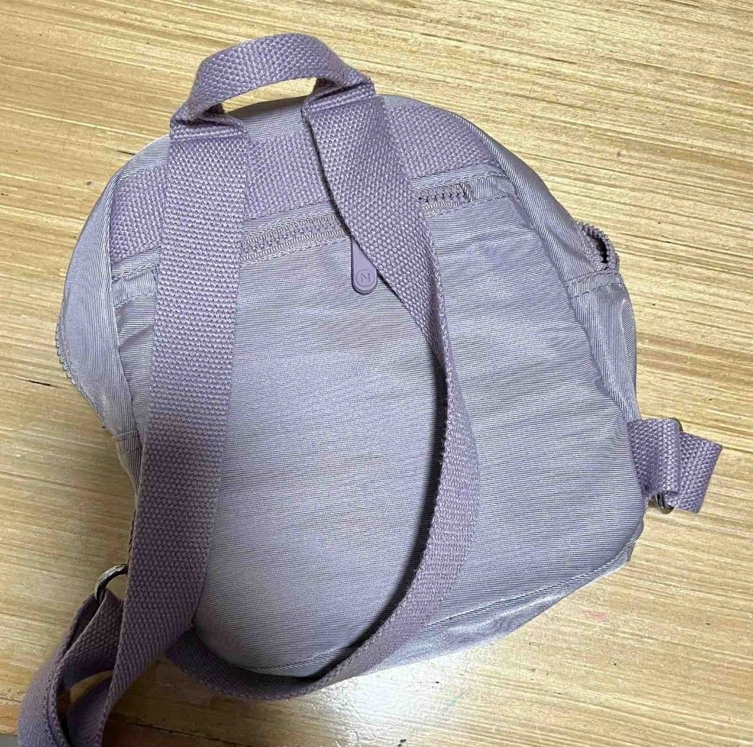 NUPrene Raya Mini Backpack Lilac Purple (Category: Backpacks) located in Quezon City. Submitted by hjc18 (Listing ID 1463604967, Image 2). Description: - Cute mini backpack from NUPrene - Lilac purple color - Main compartment - Front zip pocket - Two side pockets - Adjustable straps - Lightweight and practical - Great for everyday use or travel.