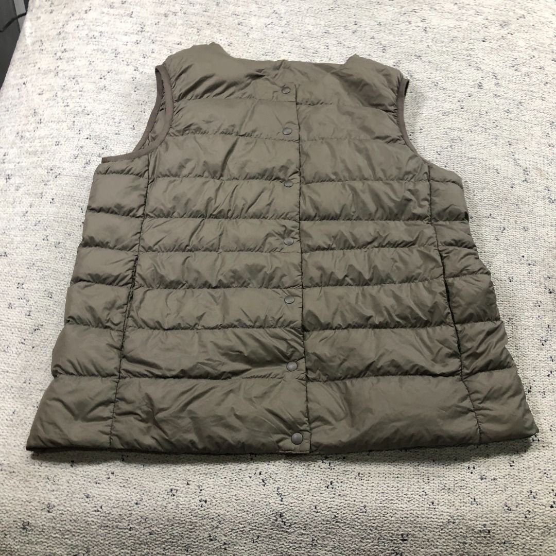 Nylon Lightweight No collar Down vest Beige Size Large (Category: Coats, Jackets and Outerwear) located in Santa Rosa. Submitted by sergids (Listing ID 1463686854, Image 3). Description: Nylon Lightweight No collar Down vest Beige Size Large Great condition. Check fitting tops to ensure this fits you. Dimensions below are exact measurements, see pics as well for comparison. 9/10 Condition and Colorway Dimensions: Check pic slide for actual size a