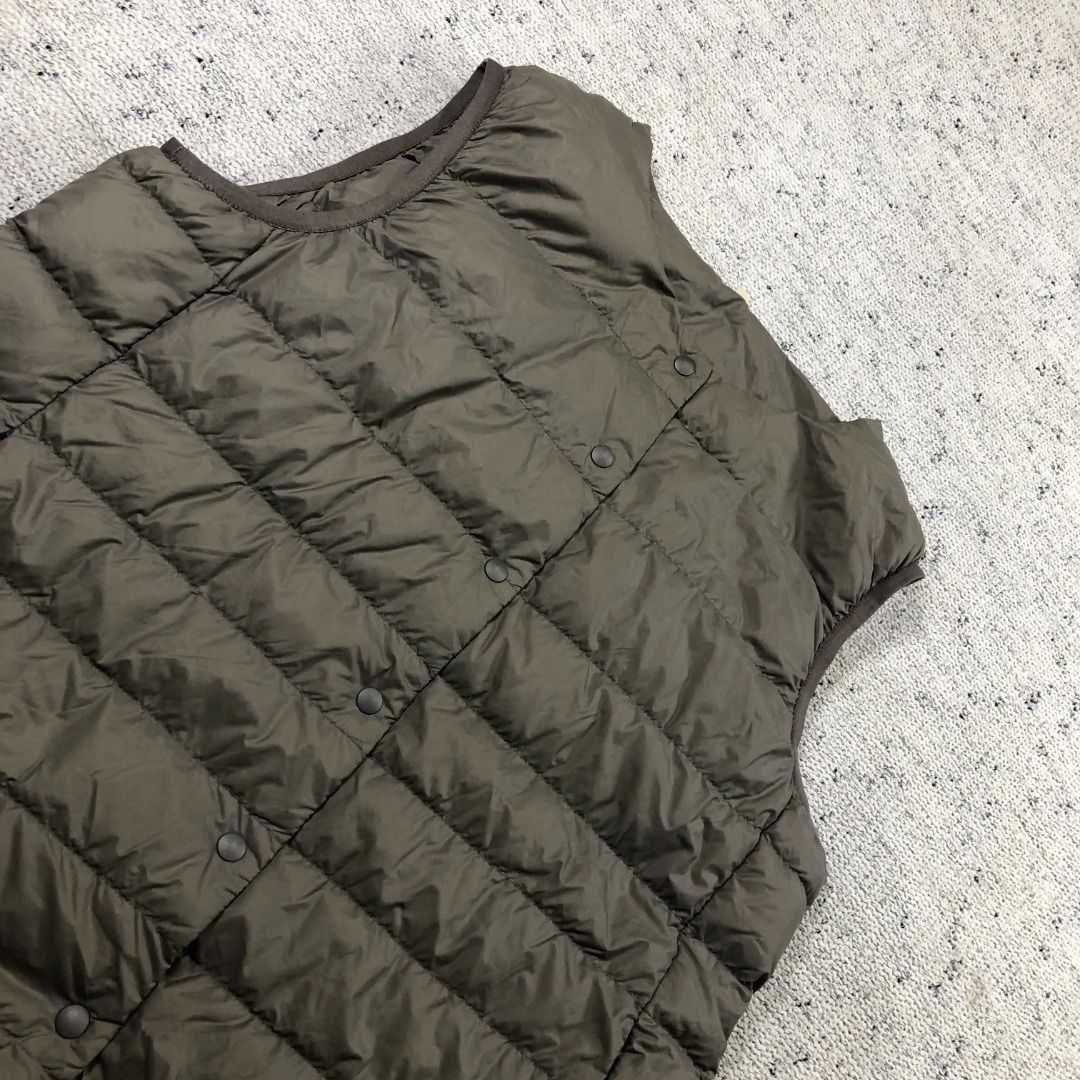 Nylon Lightweight No collar Down vest Beige Size Large (Category: Coats, Jackets and Outerwear) located in Santa Rosa. Submitted by sergids (Listing ID 1463686854, Image 2). Description: Nylon Lightweight No collar Down vest Beige Size Large Great condition. Check fitting tops to ensure this fits you. Dimensions below are exact measurements, see pics as well for comparison. 9/10 Condition and Colorway Dimensions: Check pic slide for actual size a