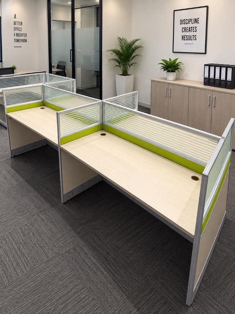 Office Cubicle Workstation Desk with Partitions (Category: Office Furniture & Fixtures) located in Quezon City. Submitted by kcofficefurnitures (Listing ID 1463711679, Image 2). Description: 🪑 4-SEATER OFFICE WORKSTATION – FOR SALE Preloved 4-Seater Office Workstation with Partition ✔️ 4-seater workstation ✔️ Complete desk setup with partitions ✔️ Light wood-grain tabletop ✔️ White lower panels with green accent ✔️ Frosted/striped glass-style up