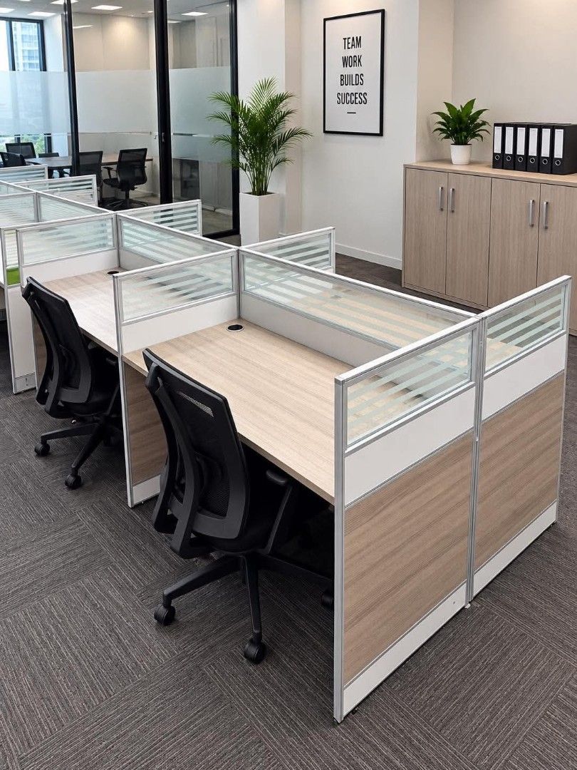Office Workstation Cubicles with Chairs (Category: Office Furniture & Fixtures) located in Quezon City. Submitted by kcofficefurnitures (Listing ID 1463711481, Image 1). Description: 🪑 OFFICE WORKSTATION WITH PARTITION – FOR SALE Preloved Office Workstation / Cubicle Set ✔️ Modern office workstation design ✔️ Wood-grain tabletop ✔️ Aluminum frame with frosted glass-style partition ✔️ Privacy panels for each workstation ✔️ With cable management h