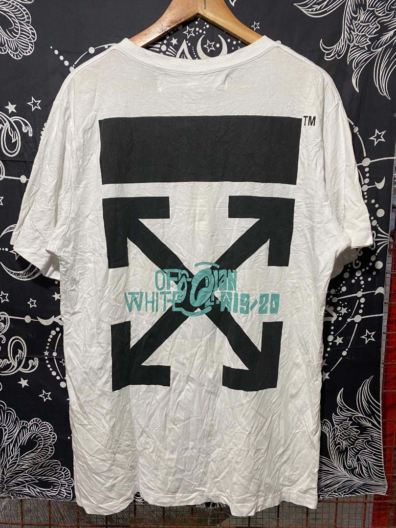 Off-White Main Label "Waterfall" Graphic Tee (Category: Tshirts & Polo Shirts ) located in Manila. Submitted by nice430 (Listing ID 1463672327, Image 3). Description: - Brand: Off-White - Color: White - Size: Medium (M) - Material: 100% Cotton - Features: Graphic print on front, iconic Off-White arrows logo on back - Style: Casual wear.