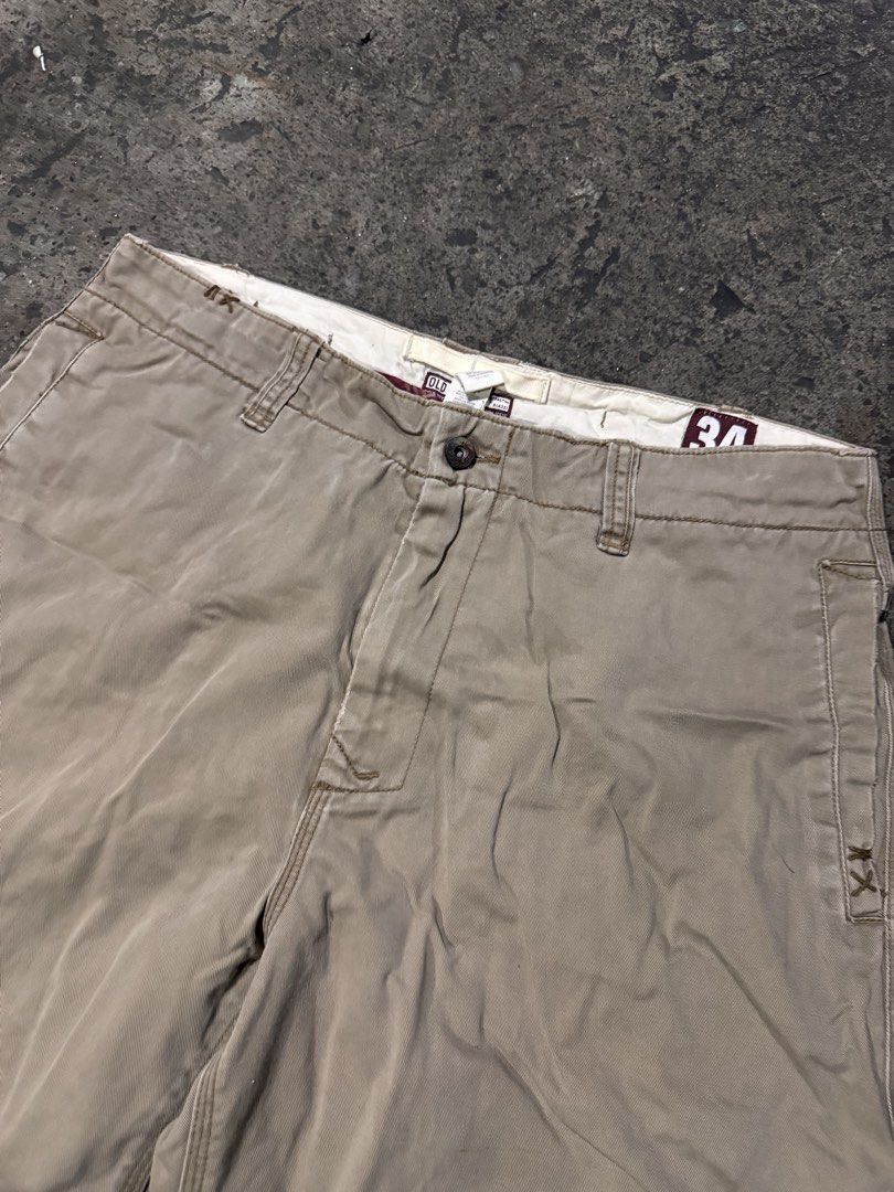 Old Navy & Dickies Shorts Bundle (Category: Shorts) located in Pasig City. Submitted by dripthrift1600 (Listing ID 1463691896, Image 3). Description: - Bundle includes: 1 pair Old Navy khaki shorts & 1 pair Dickies khaki shorts - Size: Both are size 34 - Old Navy Shorts: Features a frayed hem and minor marks on the left leg - Dickies Shorts: Classic style - Perfect for everyday casual wear - Dimes: 34x22x11.