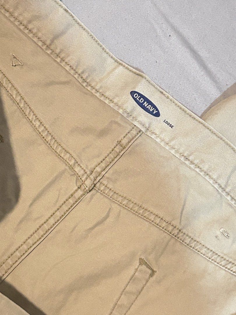 Old Navy Loose Khaki Pants 42x32 (Category: Chinos) located in Santa Rosa. Submitted by rei.accessories (Listing ID 1463719219, Image 2). Description: - Brand: Old Navy - Style: Khaki Pants - Fit: Loose - Size: 42x32 Grayish/Khaki color. Bought in US. Never been used Length: 120 cm.