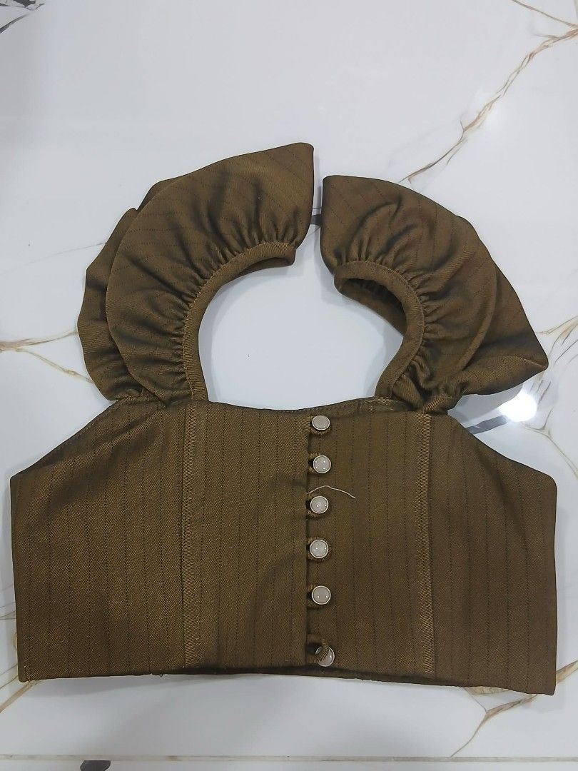 Olive Green Square Neck Crop Top with Ruffle Sleeves (Category: Sleeveless) located in Manila. Submitted by frances023 (Listing ID 1463664074, Image 1). Description: - Chic olive green crop top - Elegant square neckline with button details - Adorable ruffle sleeves - Subtle pinstripe fabric texture - Perfect for dressing up or down - Comfortable and flattering fit.