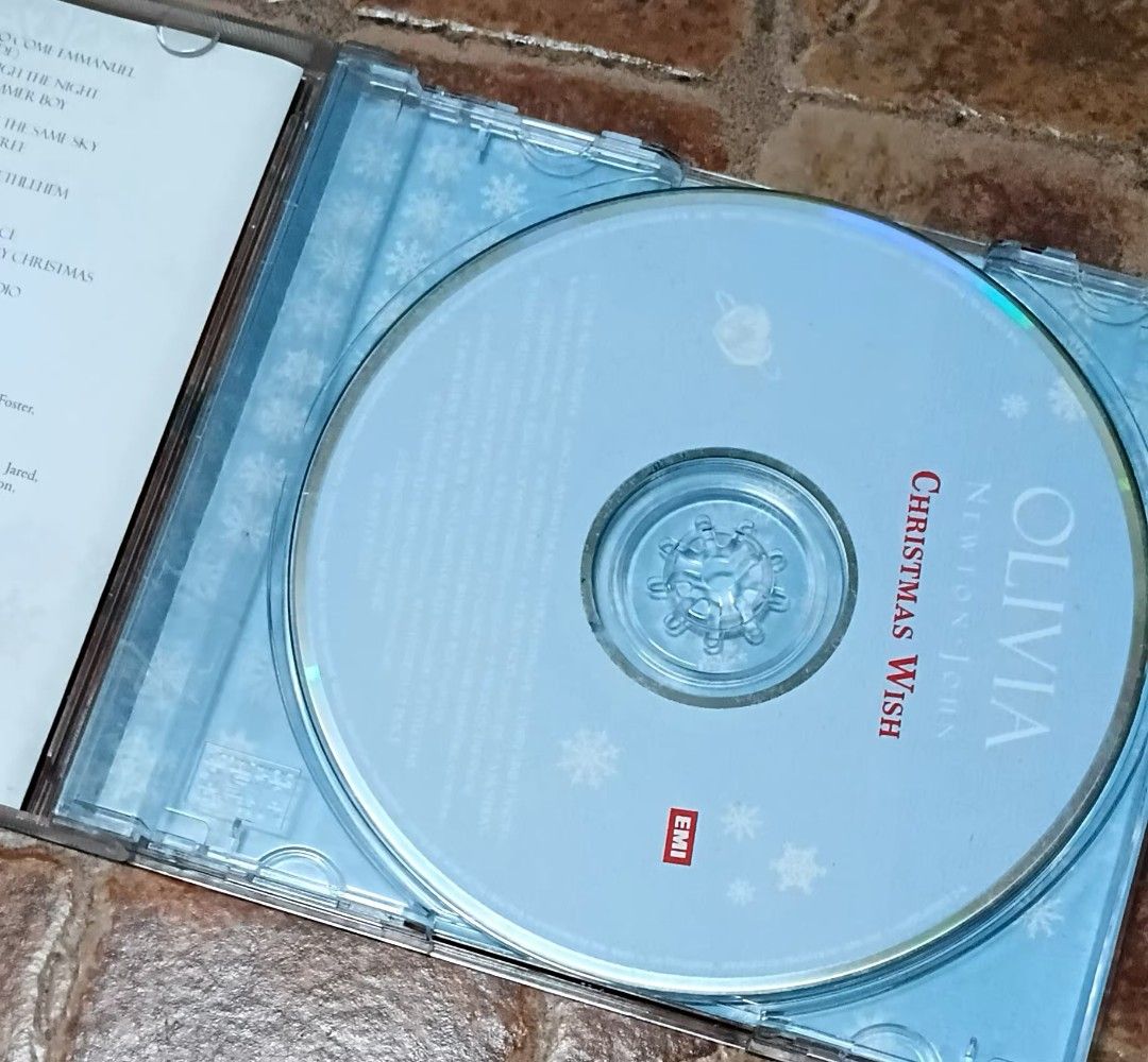 Olivia Newton-John Christmas Wish CD (Category: CDs & DVDs) located in Quezon City. Submitted by dancatz (Listing ID 1463593542, Image 2). Description: □ P 350.00 - Olivia Newton-John's Christmas Wish CD - Released in 2007 by EMI Music - Features a collection of holiday songs - Includes collaborations with: Jon Secada, Jim Brickman, Jann Arden, Michael McDonald, Marc Jordan, and Barry Manilow - A great addition to any Christmas music collection L