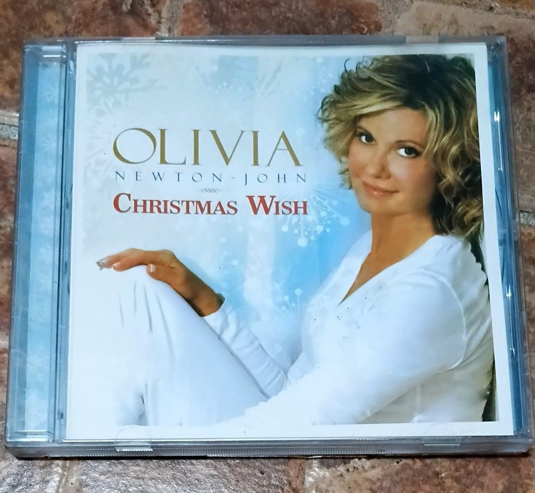 Olivia Newton-John Christmas Wish CD (Category: CDs & DVDs) located in Quezon City. Submitted by dancatz (Listing ID 1463593542, Image 1). Description: □ P 350.00 - Olivia Newton-John's Christmas Wish CD - Released in 2007 by EMI Music - Features a collection of holiday songs - Includes collaborations with: Jon Secada, Jim Brickman, Jann Arden, Michael McDonald, Marc Jordan, and Barry Manilow - A great addition to any Christmas music collection L