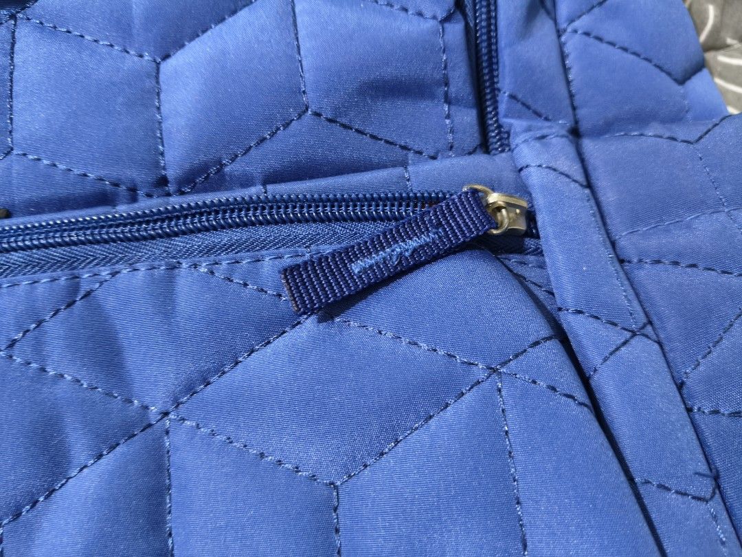 Ollin Blue Quilted Tote Bag (Category: Diaper Bags & Wetbags) located in Tarlac. Submitted by momma02 (Listing ID 1463636567, Image 3). Description: - Blue quilted tote bag from Ollin - All-over geometric pattern - Two zippered front pockets - Two side pockets - One zippered back pocket - Blue fabric handles - Ideal for everyday use or travel -very spacious -used only a few times, looks new -slightly nego. pls send your reasonable offer🩵.