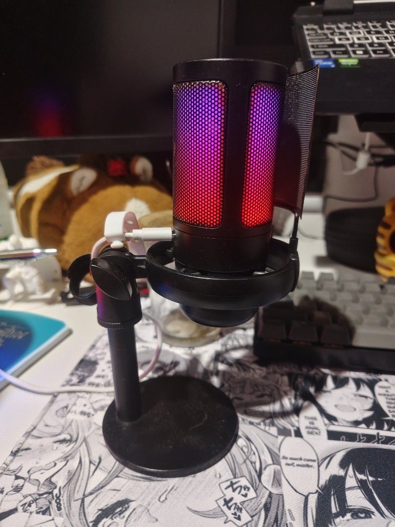 ONAIR ME6S RGB USB Microphone with Stand (Category: Microphones) located in Mabalacat. Submitted by dam-sun (Listing ID 1463644413, Image 2). Description: - Desktop microphone with vibrant RGB lighting effects (red, purple, green). - Includes a convenient stand for easy setup. - Connects seamlessly via USB for plug-and-play use. - Ideal for streaming, voiceovers, podcasts, and gaming. - Tested and confirmed to be in excellent working condition..