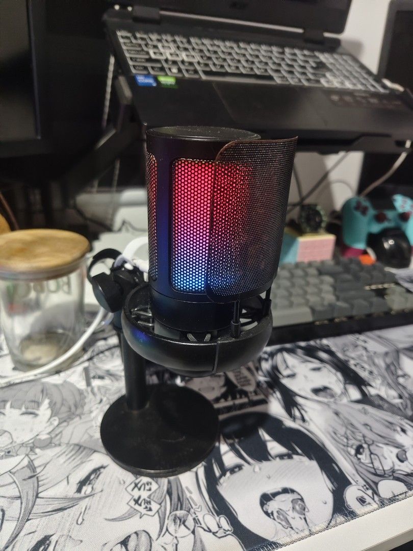 ONAIR ME6S RGB USB Microphone with Stand (Category: Microphones) located in Mabalacat. Submitted by dam-sun (Listing ID 1463644413, Image 3). Description: - Desktop microphone with vibrant RGB lighting effects (red, purple, green). - Includes a convenient stand for easy setup. - Connects seamlessly via USB for plug-and-play use. - Ideal for streaming, voiceovers, podcasts, and gaming. - Tested and confirmed to be in excellent working condition..