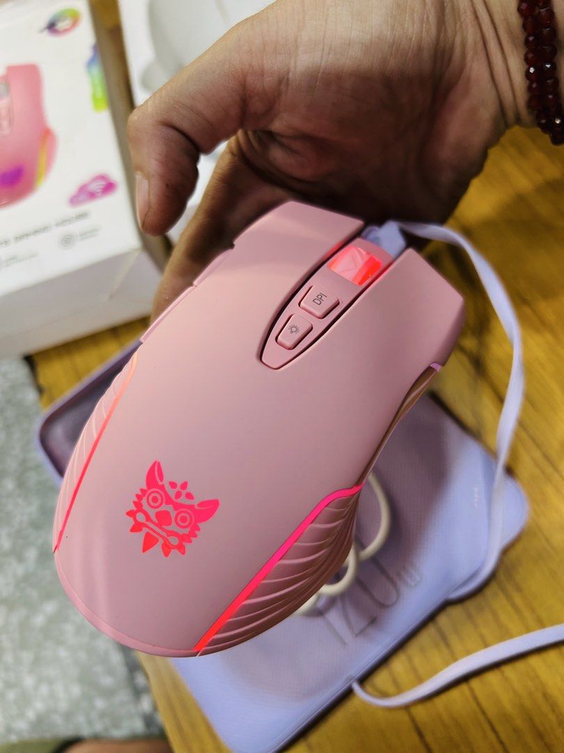 Onikuma CW905 Pink Wireless Gaming Optical LED Light Mouse (Category: Mouse & Mousepads) located in Manila. Submitted by starbalesukandjapansurplus (Listing ID 1463582393, Image 3). Description: - Pink Onikuma CW905 Wireless Gaming Mouse - Lightweight design for comfortable gaming sessions - High precision with 6400 DPI adjustable sensitivity - Vibrant RGB colorful lighting effects - 7 programmable buttons for customized control - Includes USB ca