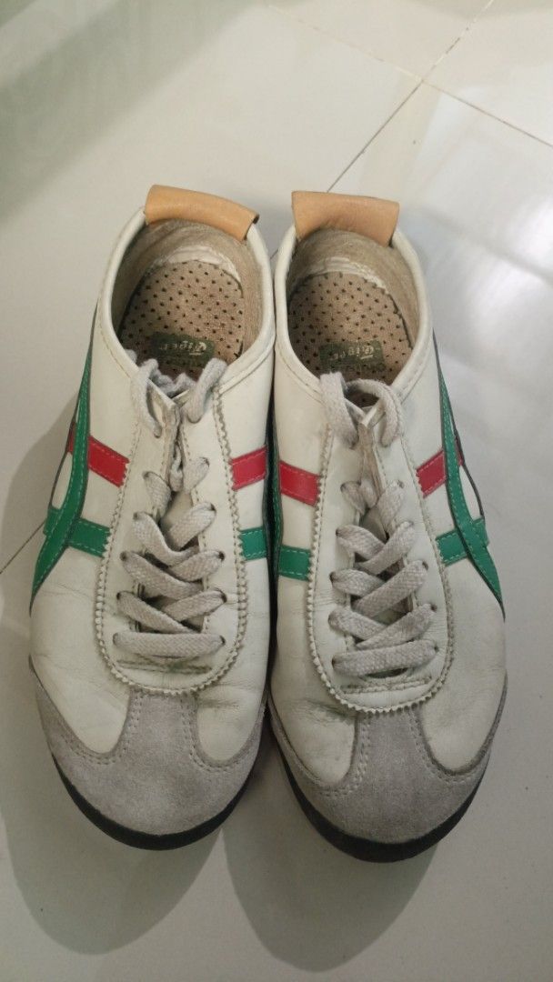 Onitsuka Tiger Mexico 66 (Category: Sneakers) located in General Trias. Submitted by sssean143 (Listing ID 1463649492, Image 1). Description: PRICE IS NEGOTIABLE!!! - Brand: Onitsuka Tiger - Model: Mexico 66 - Size: EU 38 / UK 5 / US 7 - Color: White with green and red stripes, grey suede toe cap - Features: Iconic Tiger stripes, classic silhouette, durable rubber sole Original Onitsuka Tiger Mexico 66. Bought from Onitsuka Tiger BGC for ₱8,100+.