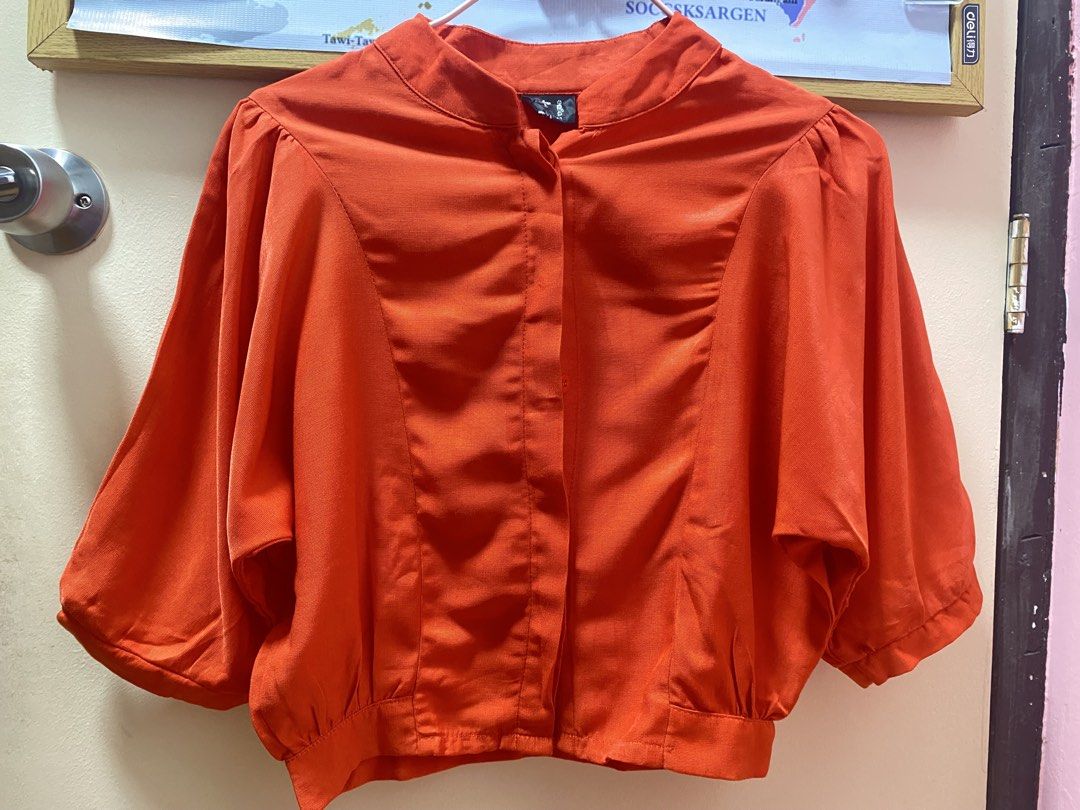 Orange Mandarin Collar Puff Sleeve Blouse (Category: Blouses) located in Quezon City. Submitted by jeseym.23 (Listing ID 1463739513, Image 2). Description: - Elegant orange blouse - Mandarin collar - Stylish puff sleeves - Button-up front - Fits Small .