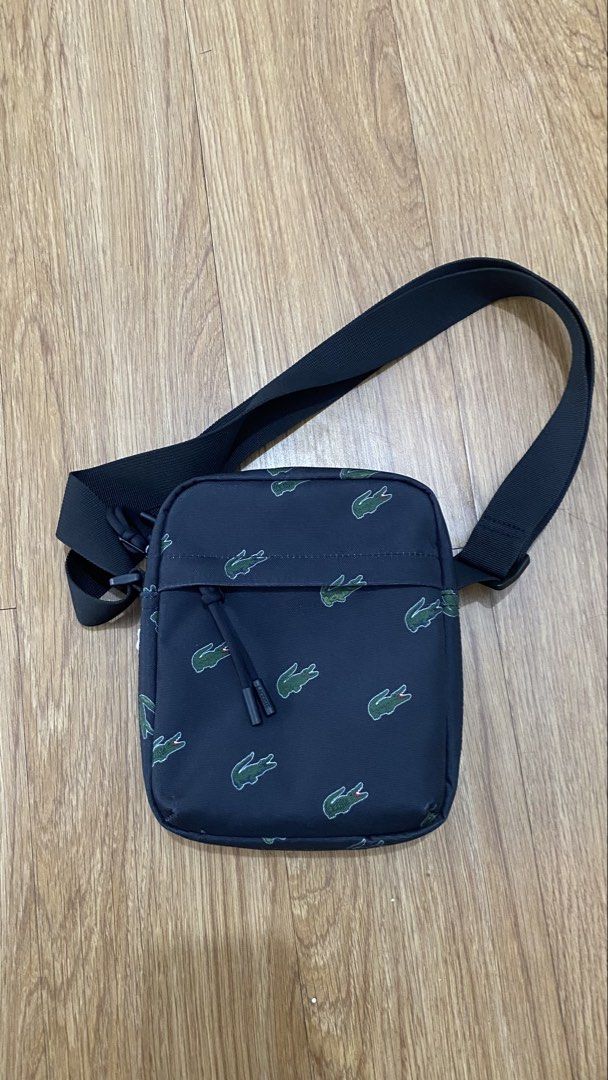 Orig Lacoste sling bag (Category: Luxury Bags & Wallets) located in Manila. Submitted by truemoon_d2e1ee (Listing ID 1463595372, Image 1). Description: Original Unisex No flaws .
