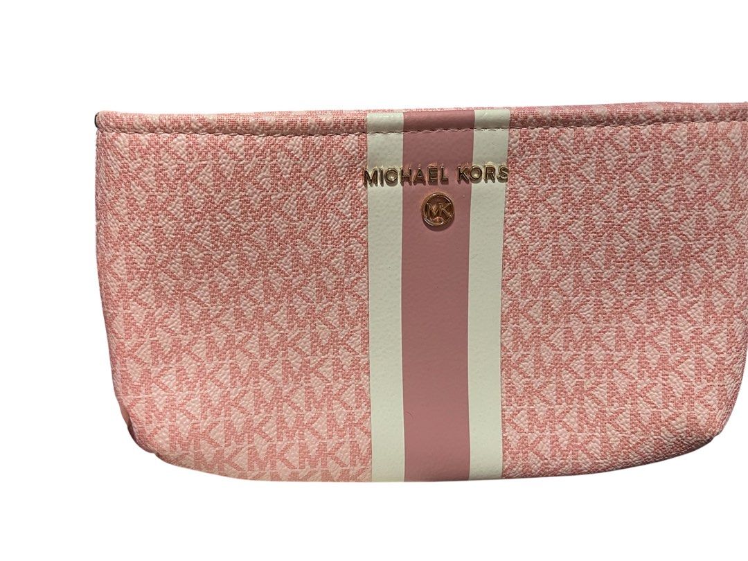 Original Michael Kors pink monogram belt bag (Category: Belt bags, Clutches and Pouches) located in Taguig. Submitted by collectionsbykhrisna (Listing ID 1463630130, Image 1). Description: Once used Michael Kors pink monogram belt bag.