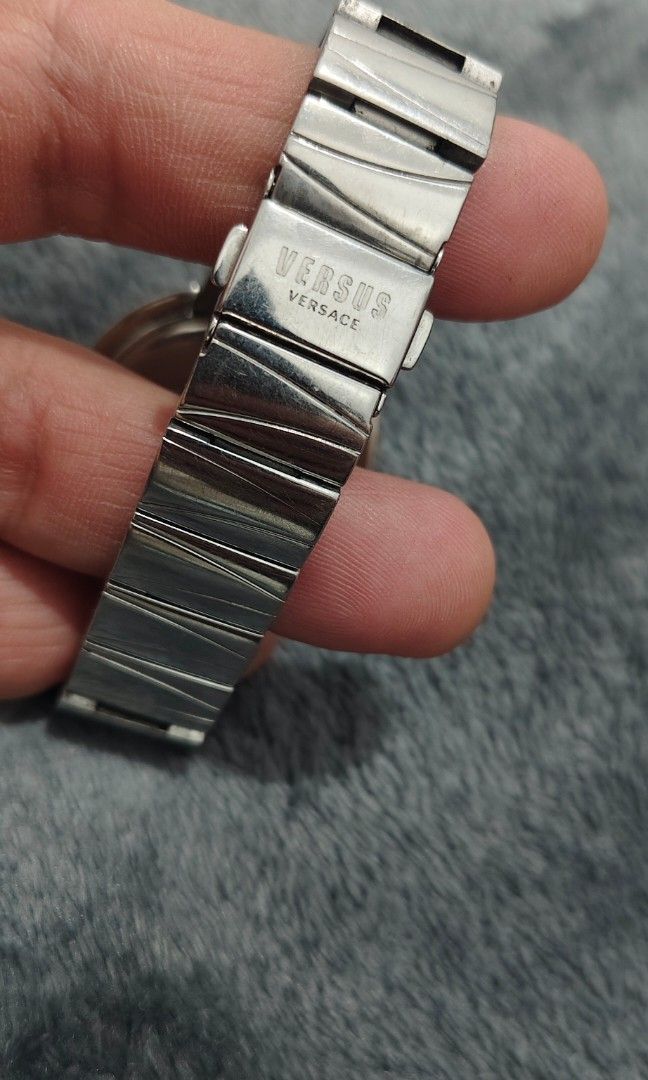 Original Versus Versace Tortona (unisex) (Category: Women's Watches) located in Cebu City. Submitted by aceoftime (Listing ID 1463712325, Image 3). Description: In good working condition Japanese analog quartz movt Beautiful textured dial with rope figured bezel Flawless crystal ( No scratches) All in stainless steal Price a steal! Watch only.