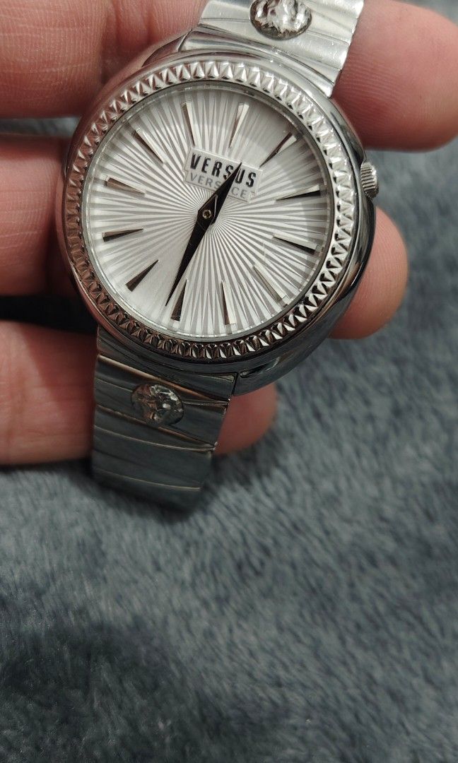 Original Versus Versace Tortona (unisex) (Category: Women's Watches) located in Cebu City. Submitted by aceoftime (Listing ID 1463712325, Image 1). Description: In good working condition Japanese analog quartz movt Beautiful textured dial with rope figured bezel Flawless crystal ( No scratches) All in stainless steal Price a steal! Watch only.