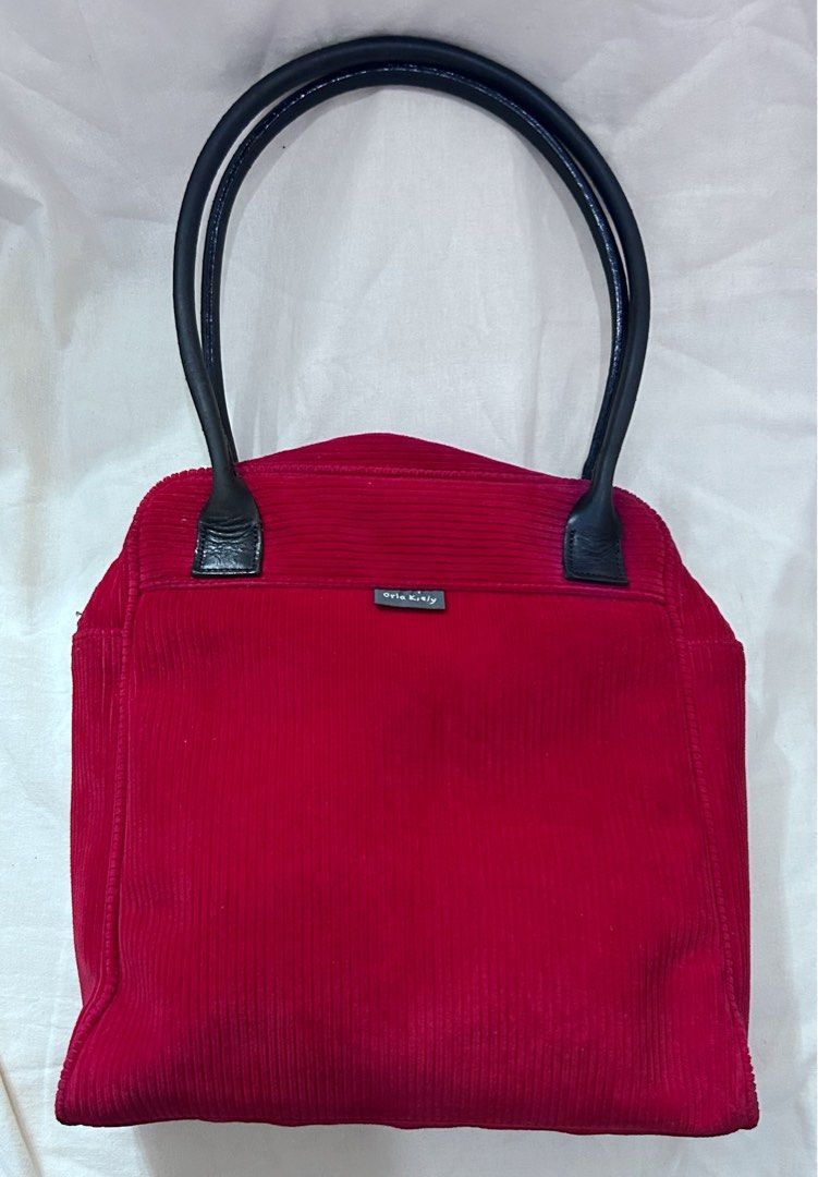 Orla Keily Red Bag (Category: Shoulder Bags) located in Makati City. Submitted by cestparfaitvintagejewelries (Listing ID 1463657360, Image 1). Description: Flaw:The back part has a small stain, and the handle has some cracks, but overall it’s still in good condition. .