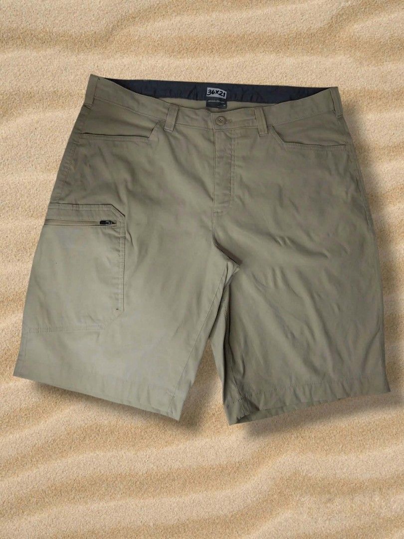 Outdoor trekking short (Category: Shorts) located in Samal. Submitted by mltd_06 (Listing ID 1463565103, Image 2). Description: ⛰️ EDDIE BAUER OUTDOOR CARGO SHORTS - LEGIT! Size 36 - Waist 36, Length 21 Color: Khaki / Olive Fabric: Quick-dry / Lightweight - pang hiking / fishing / beach Details: - Zipper cargo pocket with EB logo pull - 2 front + 2 back pockets - Button closure, belt loops - Good condition, no butas / no stains Perfect for: Hikin