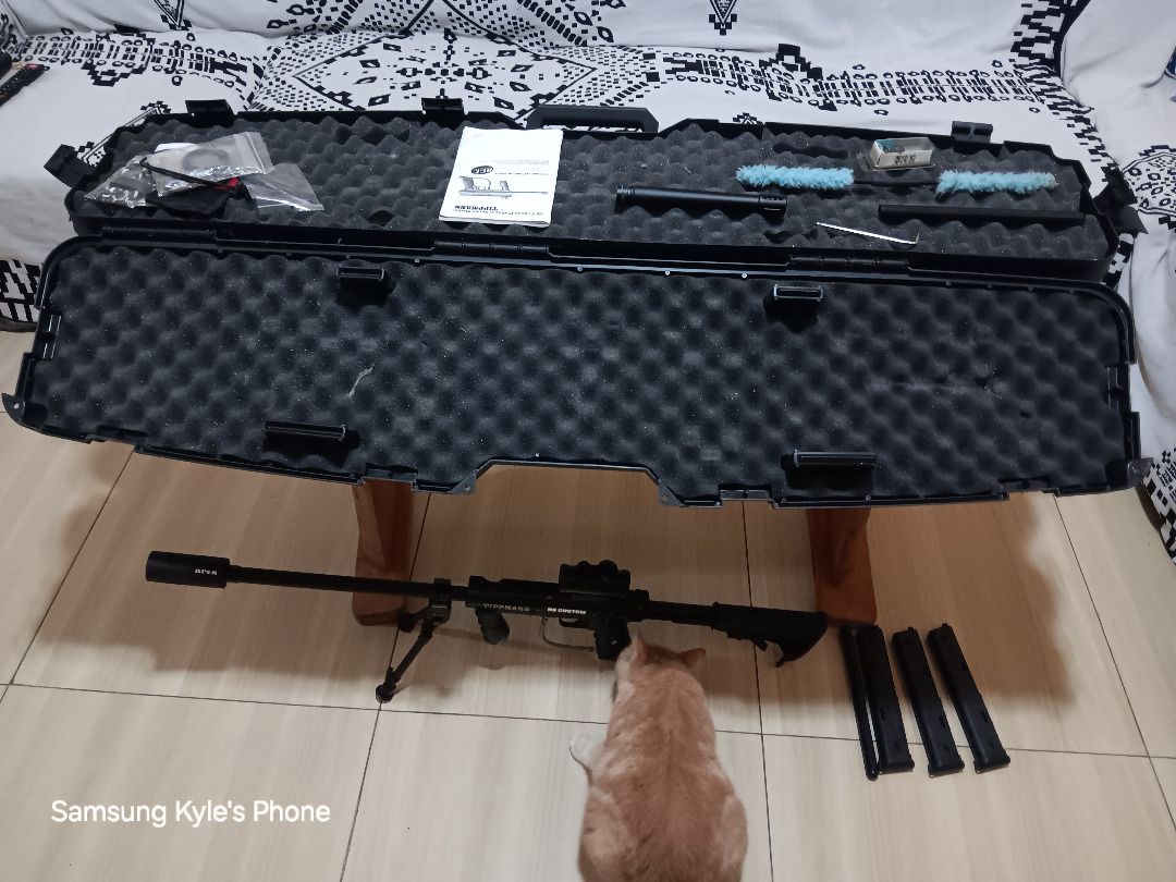 Paintball Set (Category: Other Sports Equipment and Supplies) located in Caloocan City. Submitted by 01111011 (Listing ID 1463683118, Image 2). Description: This is a milsim paintball marker, NOT a weapon! Tippmann 98 Custom with: - 1 standard barrel - 1 straight-bored long barrel - 1 Apex tip/ramp (for trick shots) - 1 expandable stock - 1 bipod - 3 20-round ZetaMags (10 rounds x 2 sides) - 1 red dot sight - 5 variable springs (used to change th