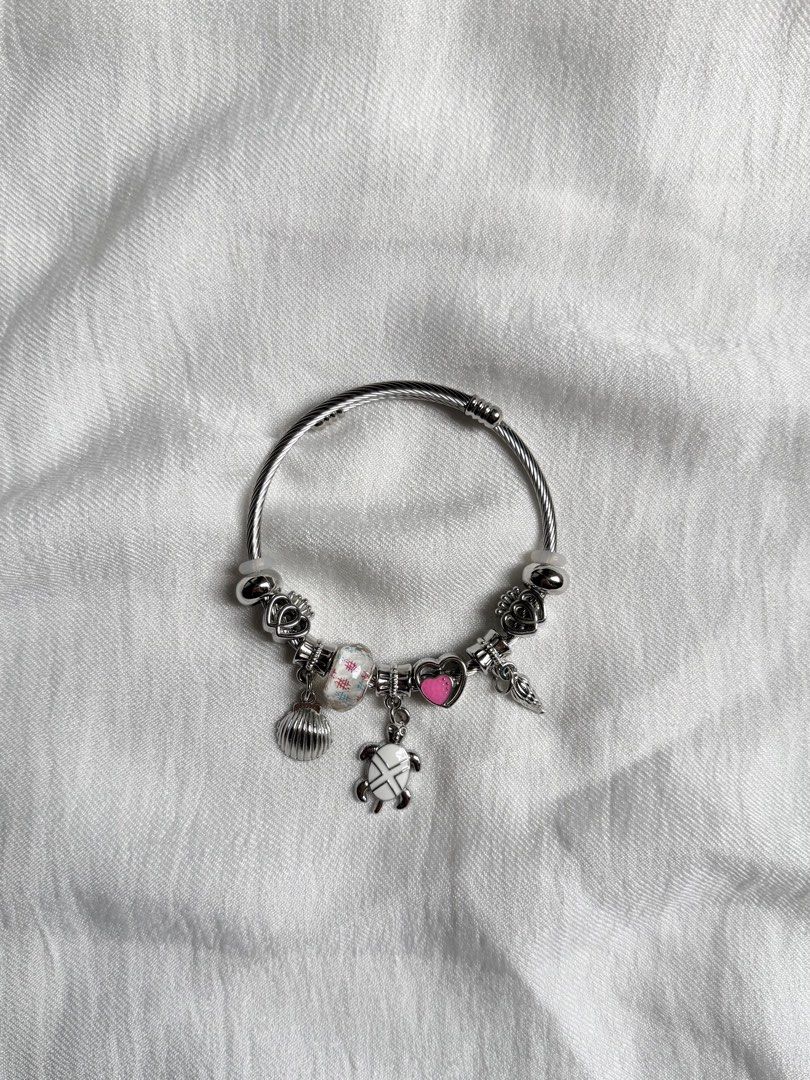 ASSORTED PANDORA BANGLE (Category: Bracelets) located in Quezon City. Submitted by rae.e13 (Listing ID 1463688602, Image 2). Description: With box and paperbag Perfect for gifts ₱350 each Different designs.
