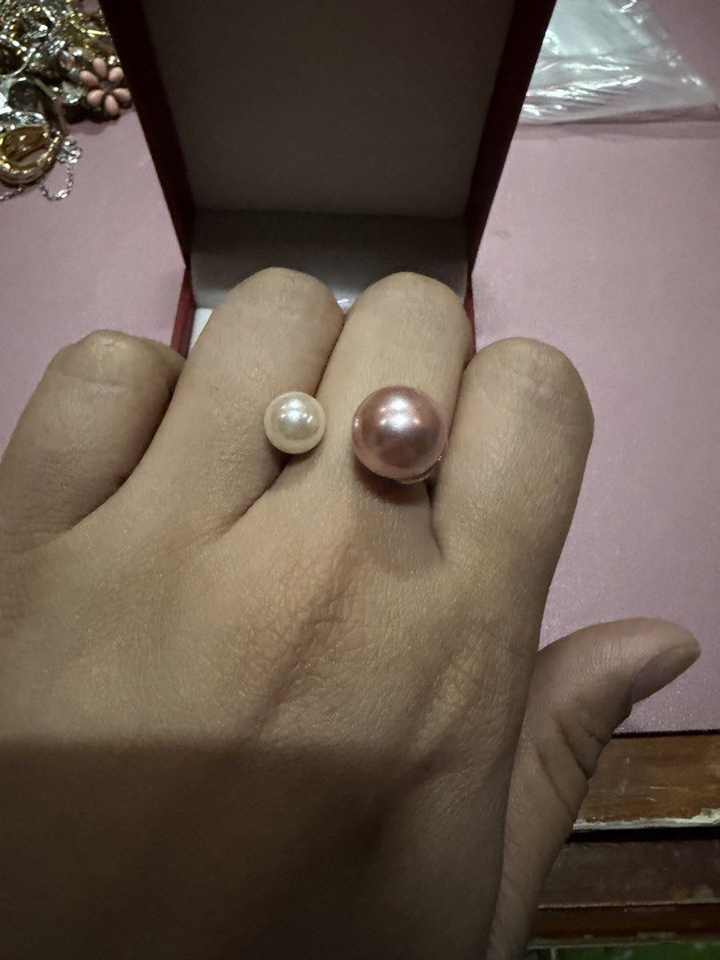 Pearl Double Ball Stud Earrings and Ring Set (Category: Earrings) located in Pasig City. Submitted by aprilluxcloset0812 (Listing ID 1463737493, Image 3). Description: - Set includes a pair of double ball pearl stud earrings and a matching pearl ring. - Earrings: Large pink pearl at the back, smaller cream pearl at the front. - Ring: Features a large pink pearl and a smaller cream pearl. - All pieces have a sophisticated gold-tone finish. Fashion