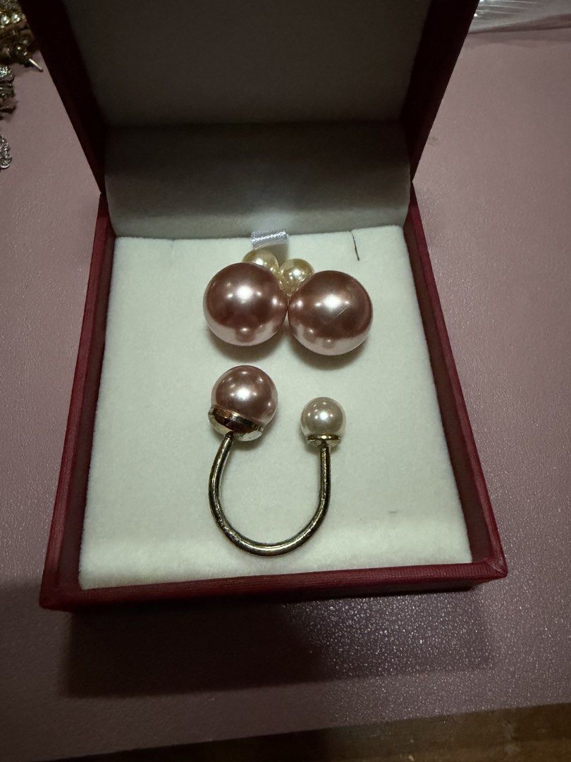 Pearl Double Ball Stud Earrings and Ring Set (Category: Earrings) located in Pasig City. Submitted by aprilluxcloset0812 (Listing ID 1463737493, Image 1). Description: - Set includes a pair of double ball pearl stud earrings and a matching pearl ring. - Earrings: Large pink pearl at the back, smaller cream pearl at the front. - Ring: Features a large pink pearl and a smaller cream pearl. - All pieces have a sophisticated gold-tone finish. Fashion