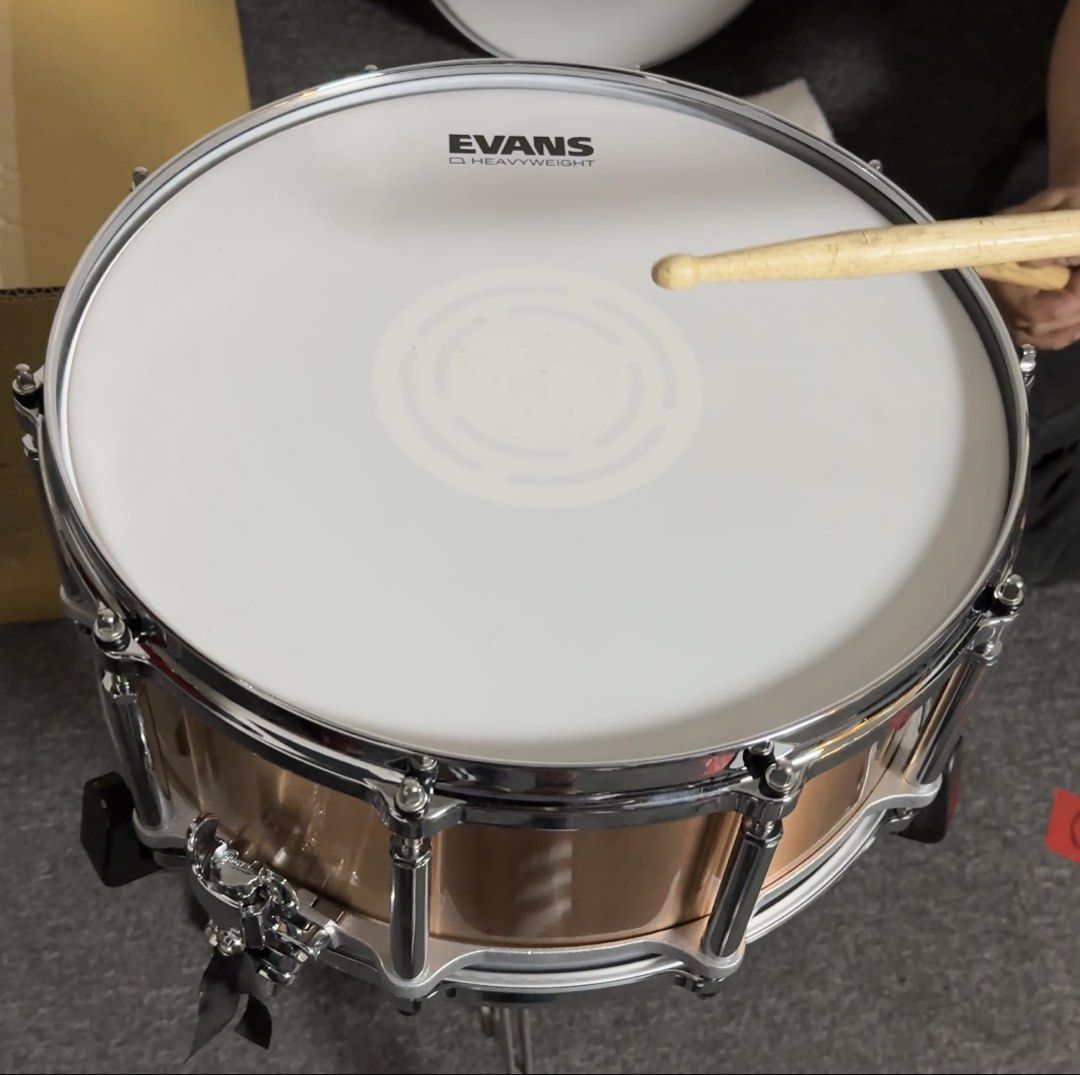 Pearl Phosphor Bronze Free Floating System Snare Drum (Category: Musical Instruments) located in Paranaque City. Submitted by musikisellerph (Listing ID 1463678563, Image 1). Description: Pearl Phosphor Bronze 14x6.5 Free Floating System for Php 34,000 negotiable with Box and Drum Key. Bought Dec 2024 from JB Pasay Road. Still have the receipt also if you want to see it. Fitted with Evans Heavyweight Top and Evans 500 Reso Bottom Used once in the