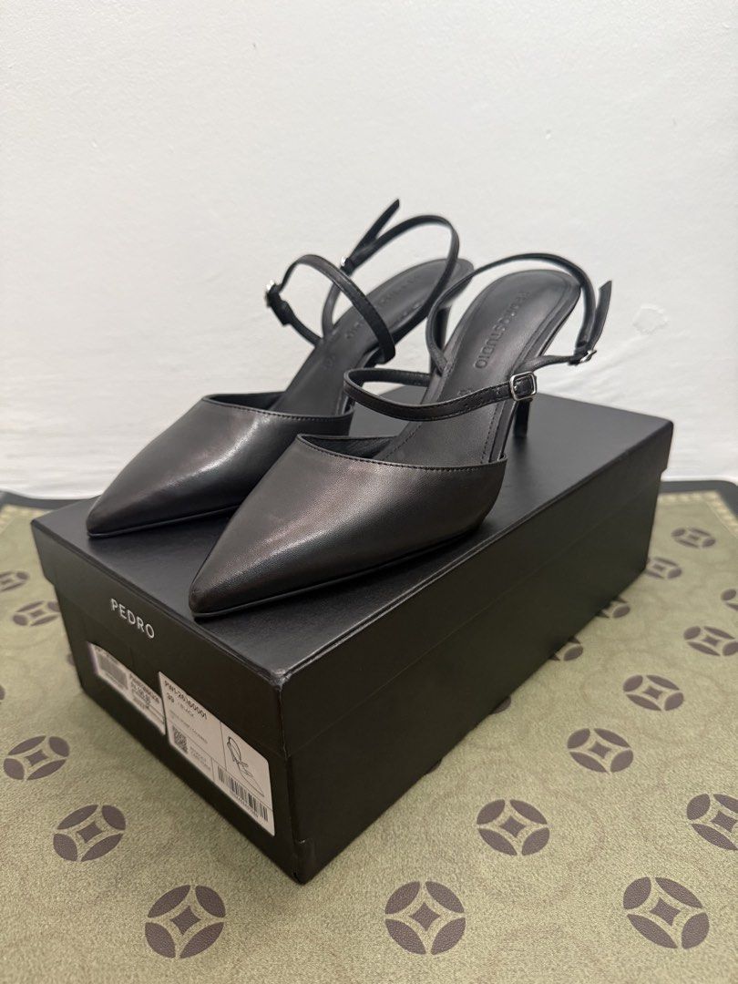 PEDRO Leather Slingback Stiletto Pumps - Size 39 (Category: Heels) located in Quezon City. Submitted by pmaveenjoh81635 (Listing ID 1463716867, Image 2). Description: WTS/LFB PEDRO Leather Slingback Stiletto Pumps - Size 39 PHP 980 (SRP 4,195) Fitted Only/Still New Condition Product Details: * Brand: PEDRO (PEDRO STUDIO) * Color: Black * Size: EU 39 / US 8 Womens * Style: Pointed Toe Slingback Stiletto Heels with Mary Jane Ankle Strap * Sleek, el