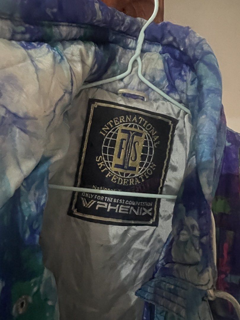 Phenix International Ski Federation Ski Jacket (Category: Coats, Jackets and Outerwear) located in Las Pinas. Submitted by porshuh (Listing ID 1463617410, Image 2). Description: Las Piñas Loc No issue, RFS decluttering - Vintage Phenix ski jacket - Features International Ski Federation (FIS) logo - Bold tie-dye pattern in blue, purple, and green - Multiple pockets for storage - Adjustable drawstring waist for a custom fit - Ideal for skiing or a 