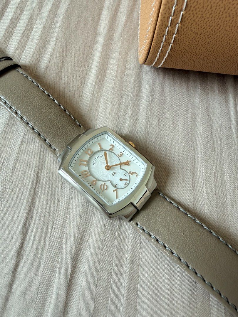 Philip Stein Watch with Original Box (Category: Women's Watches) located in Muntinlupa City. Submitted by themarketday (Listing ID 1463603006, Image 1). Description: Philip Stein watch Mother of Pearl Preloved ▪️Taupe strap with buckle closure ▪️with extra White Strap ▪️Unique rectangular case shape ▪️Comes with original tan leather storage box Original Price: Php 26,000 Selling now at Php 15,000.